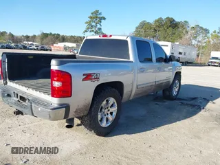2011 Chevrolet Silverado 1500 LTZ with VIN 3GCPKTE37BG199091, listed as a IAAI auction lot 41843184 with 171,634 mi miles and . Bid and sale history available at DreamBid. Image 4.