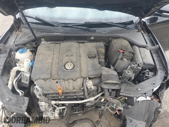 2013 Volkswagen Passat SE z VIN 1VWBH7A37DC110614, wystawiony jako Copart lot #55903665 z przebiegiem 121 117 mil mil oraz Szkoda całkowita • Salvage title. Historia ofert i sprzedaży dostępna na DreamBid. Obrazek 11.