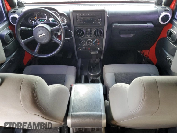2008 Jeep Wrangler Unlimited X with VIN 1J4GB39198L515007, listed as a Copart auction lot 78979004 with 158,929 mi miles and Salvage Title. Bid and sale history available at DreamBid. Image 8.