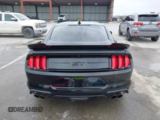 2021 Ford Mustang GT z VIN 1FA6P8CF2M5149643, wystawiony jako IAAI lot #41981794 z przebiegiem 57 345 mil mil oraz . Historia ofert i sprzedaży dostępna na DreamBid. Obrazek 16.
