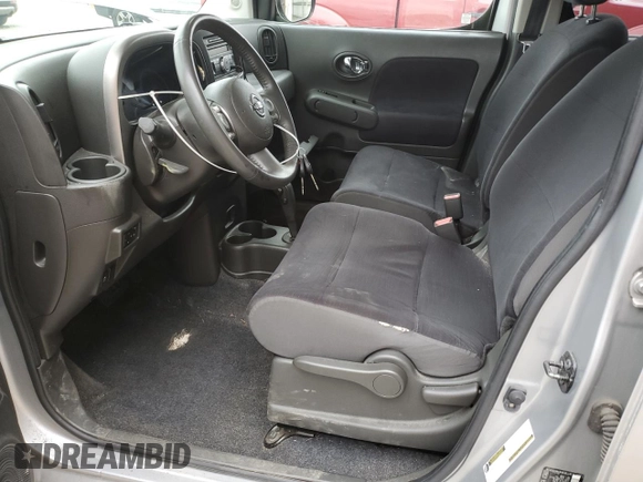 2011 Nissan Cube S z VIN JN8AZ2KR7BT203409, wystawiony jako Copart lot #57001145 z przebiegiem 127 446 mil mil oraz Tytuł czysty. Historia ofert i sprzedaży dostępna na DreamBid. Obrazek 7.