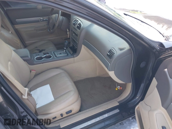 2006 Lincoln LS Sport with VIN 1LNHM87A36Y614454, listed as a IAAI auction lot 41532800 with 107,391 mi miles and . Bid and sale history available at DreamBid. Image 5.