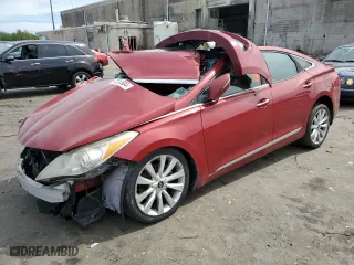 2013 Hyundai Azera with VIN KMHFH4JG3DA311553, listed as a Copart auction lot 70242604 with 0 mi miles and Salvage Title. Bid and sale history available at carsss.com. Image 1.