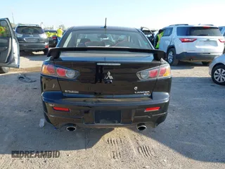 2014 Mitsubishi Lancer Ralliart with VIN JA32V6FVXEU005172, listed as a IAAI auction lot 41983895 with 70,584 mi miles and . Bid and sale history available at DreamBid. Image 16.