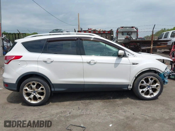 2016 Ford Escape Titanium with VIN 1FMCU9J92GUA71444, listed as a IAAI auction lot 42334603 with 79,780 mi miles and . Bid and sale history available at DreamBid. Image 13.