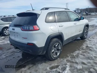 2019 Jeep Cherokee Trailhawk Elite with VIN 1C4PJMBX0KD315275, listed as a IAAI auction lot 41630464 with 94,558 mi miles. Bid and sale history available at carsss.com. Image 4.