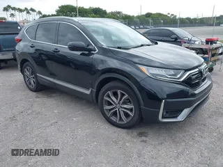 2021 Honda CR-V Touring with VIN 2HKRW1H91MH410751, listed as a IAAI auction lot 41286168 with 56,314 mi miles. Bid and sale history available at carsss.com. Image 1.