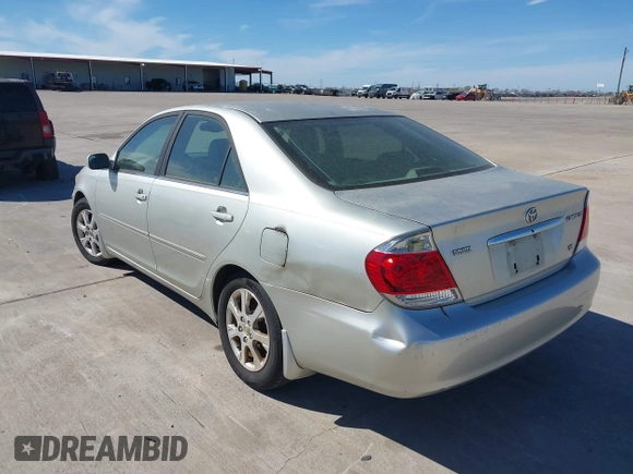 2005 Toyota Camry LE with VIN JTDBF32KX50162491, listed as a IAAI auction lot 41828892 with 98,541 mi miles and . Bid and sale history available at DreamBid. Image 3.