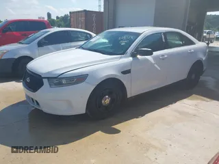 2013 Ford Police Interceptor z VIN 1FAHP2M8XDG127013, wystawiony jako IAAI lot #42692806 z przebiegiem 265 436 mil mil oraz . Historia ofert i sprzedaży dostępna na DreamBid. Obrazek 2.