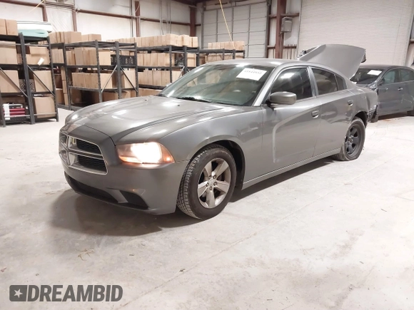 2012 Dodge Charger SE with VIN 2C3CDXBG4CH211131, listed as a IAAI auction lot 41844932 with 143,231 mi miles and . Bid and sale history available at DreamBid. Image 2.