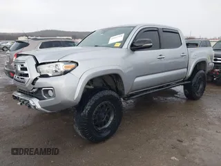 2018 Toyota Tacoma SR with VIN 5TFGZ5AN4JX142565, listed as a IAAI auction lot 41353718 with 87,544 mi miles and . Bid and sale history available at carsss.com. Image 17.