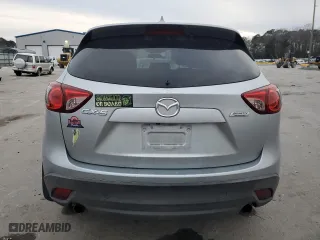 2016 Mazda CX-5 Touring with VIN JM3KE2CY1G0884474, listed as a Copart auction lot 41910975 with 106,120 mi miles and Salvage Title. Bid and sale history available at carsss.com. Image 6.