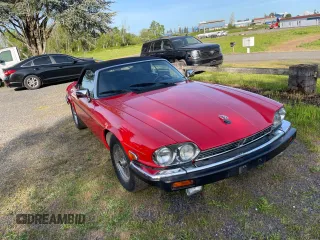 1990 Jaguar XJS z VIN SAJNW4846LC167051, wystawiony jako Copart lot #56001285 z przebiegiem 89 003 mil mil oraz Tytuł czysty. Historia ofert i sprzedaży dostępna na DreamBid. Obrazek 1.