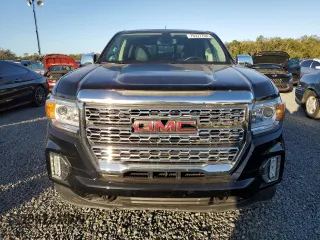 2021 GMC Canyon 2WD Denali with VIN 1GTG5EEN2M1107052, listed as a Copart auction lot 76377704 with 11,696 mi miles and Salvage Title. Bid and sale history available at carsss.com. Image 5.