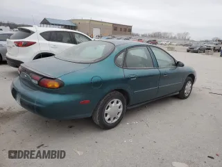 1997 Ford Taurus G with VIN 1FALP51U2VG299048, listed as a Copart auction lot 85742504 with 123,356 mi miles and Salvage Title. Bid and sale history available at carsss.com. Image 3.