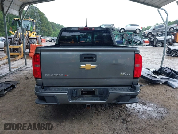 2018 Chevrolet Colorado 4WD LT z VIN 1GCGTCEN6J1146104, wystawiony jako IAAI lot #42338356 z przebiegiem 71 043 mil mil oraz . Historia ofert i sprzedaży dostępna na DreamBid. Obrazek 17.