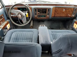 1990 Cadillac Brougham z VIN 1G6DW54Y9LR710711, wystawiony jako Copart lot #57469165 z przebiegiem Nie podano mil oraz Nie do naprawy • Non repairable. Historia ofert i sprzedaży dostępna na DreamBid. Obrazek 8.