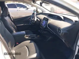 2020 Toyota Prius L Eco with VIN JTDKARFUXL3107211, listed as a IAAI auction lot 42797561 with 328,023 mi miles and . Bid and sale history available at DreamBid. Image 5.