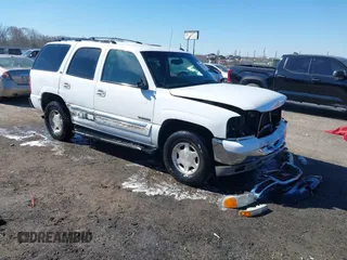 2003 GMC Yukon SLT with VIN 1GKEC13Z13J197955, listed as a IAAI auction lot 41586841 with 208,752 mi miles. Bid and sale history available at carsss.com. Image 1.