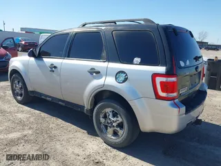 2010 Ford Escape XLT with VIN 1FMCU0DG3AKA09821, listed as a IAAI auction lot 41785754 with 208,875 mi miles. Bid and sale history available at carsss.com. Image 3.