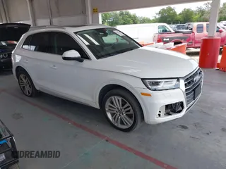 2020 Audi Q5 Premium Plus z VIN WA1BNAFYXL2059038, wystawiony jako IAAI lot #42397030 z przebiegiem 103 983 mil mil oraz . Historia ofert i sprzedaży dostępna na DreamBid. Obrazek 1.