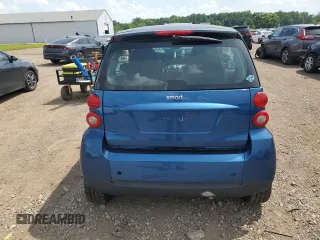 2009 Smart fortwo Pure with VIN WMEEJ31X59K218003, listed as a Copart auction lot 62413775 with 82,711 mi miles and Salvage title. Bid and sale history available at DreamBid. Image 6.
