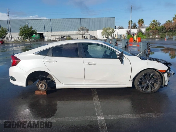 2019 Honda Civic Sport with VIN 19XFC2F86KE215368, listed as a IAAI auction lot 41934715 with 50,253 mi miles and . Bid and sale history available at DreamBid. Image 12.