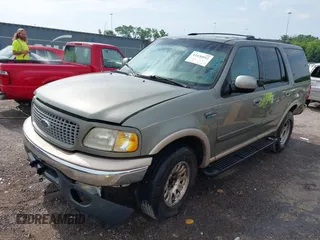 1999 Ford Expedition XLT with VIN 1FMPU18L2XLB53295, listed as a IAAI auction lot 42436012 with Not provided miles and . Bid and sale history available at DreamBid. Image 2.