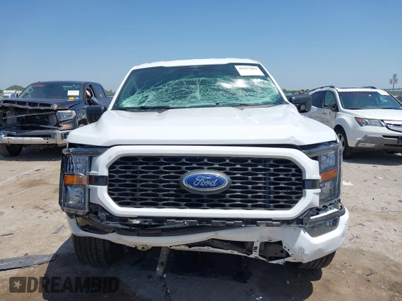 2023 Ford F-150 XL with VIN 1FTEW1CP5PKF42521, listed as a IAAI auction lot 42257062 with 30,758 mi miles and . Bid and sale history available at DreamBid. Image 12.