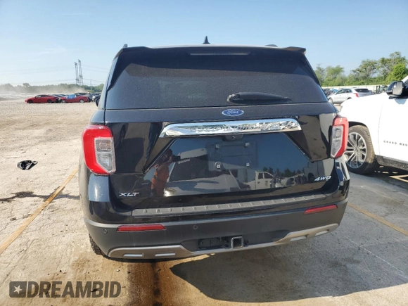 2023 Ford Explorer XLT with VIN 1FMSK8DH7PGB08372, listed as a Copart auction lot 62395205 with 63,257 mi miles and Salvage title. Bid and sale history available at DreamBid. Image 6.