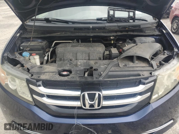 2014 Honda Odyssey EX-L with VIN 5FNRL5H63EB013483, listed as a Copart auction lot 63002435 with 127,059 mi miles and Salvage title. Bid and sale history available at DreamBid. Image 12.