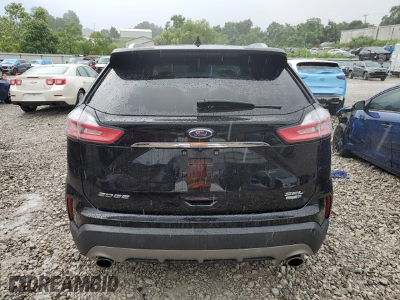 2019 Ford Edge SEL с VIN 2FMPK4J99KBB47542, выставлен на аукционе Copart как лот 63682005 с пробегом 82 046 миль миль и Списание • Salvage title. История ставок и продаж доступна на DreamBid. Изображение 6.