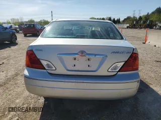 2000 Toyota Avalon XL with VIN 4T1BF28B5YU031947, listed as a Copart auction lot 56239265 with 167,627 mi miles and Salvage title. Bid and sale history available at DreamBid. Image 6.