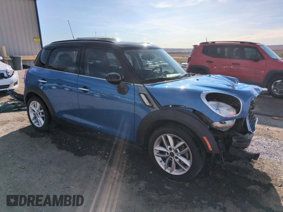 2012 MINI Countryman S with VIN WMWZC3C57CWL80976, listed as a Copart auction lot 50023105 with 74,504 mi miles and Salvage Title. Bid and sale history available at DreamBid. Image 4.