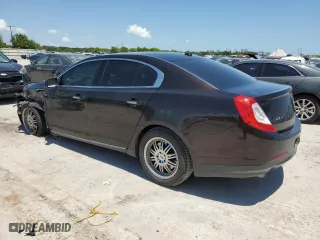 2013 Lincoln MKS with VIN 1LNHL9DK0DG615859, listed as a Copart auction lot 66994754 with 105,133 mi miles and Salvage Title. Bid and sale history available at carsss.com. Image 2.