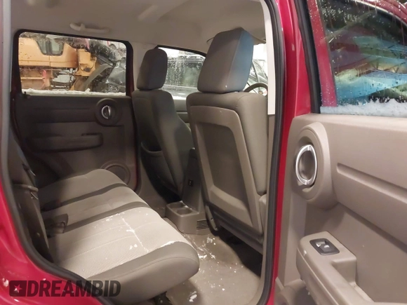 2009 Dodge Nitro SE with VIN 1D8GU28K79W522396, listed as a IAAI auction lot 41399429 with 148,727 mi miles and . Bid and sale history available at DreamBid. Image 8.