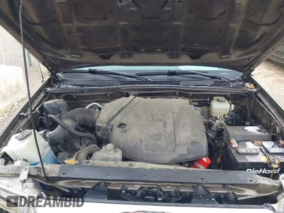 2015 Toyota Tacoma with VIN 3TMLU4EN8FM198605, listed as a IAAI auction lot 42039238 with 132,109 mi miles and . Bid and sale history available at DreamBid. Image 10.