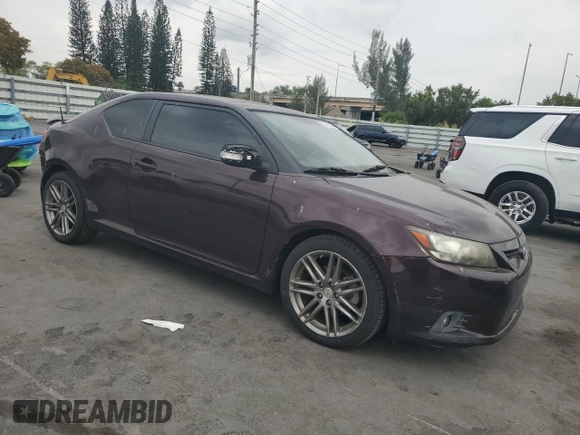 2012 Scion tC with VIN JTKJF5C7XC3032281, listed as a Copart auction lot 50472225 with 101,304 mi miles and Salvage Title. Bid and sale history available at carsss.com. Image 4.