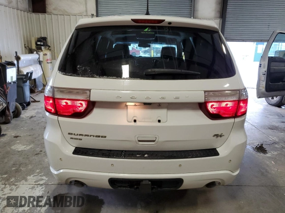 2013 Dodge Durango R/T with VIN 1C4SDJCT7DC675499, listed as a Copart auction lot 88967505 with 122,642 mi miles and Salvage title. Bid and sale history available at DreamBid. Image 6.
