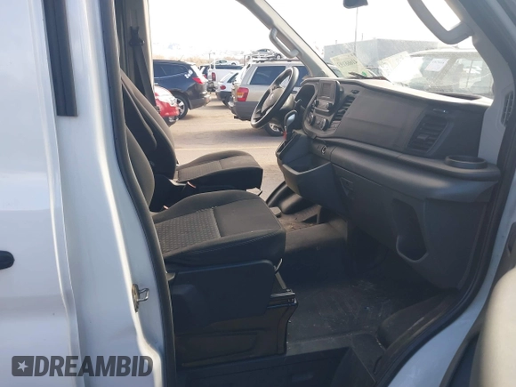 2020 Ford Transit Cargo with VIN 1FTBR2CG1LKB43034, listed as a IAAI auction lot 41668193 with 56,827 mi miles and . Bid and sale history available at DreamBid. Image 5.
