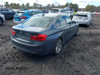 2018 BMW 3 Series 330i xDrive with VIN WBA8D9G59JNU72227, listed as a IAAI auction lot 41463619 with 79,987 mi miles and . Bid and sale history available at DreamBid. Image 4.