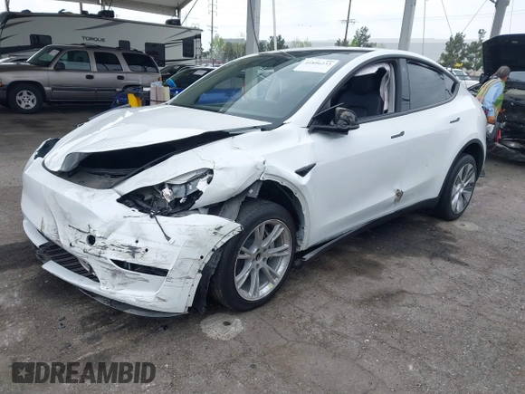 2022 Tesla Model Y Long Range with VIN 7SAYGDEE3NF518061, listed as a IAAI auction lot 41896233 with 34,714 mi miles and . Bid and sale history available at carsss.com. Image 17.