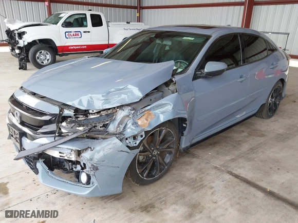 2018 Honda Civic Hatchback Sport Touring with VIN SHHFK7H90JU423243, listed as a IAAI auction lot 41687234 with 55,341 mi miles. Bid and sale history available at carsss.com. Image 20.