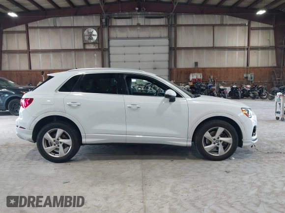 2020 Audi Q3 Premium with VIN WA1AECF3XL1090825, listed as a IAAI auction lot 42541577 with 32,432 mi miles and . Bid and sale history available at DreamBid. Image 13.