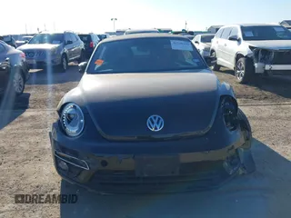 2014 Volkswagen Beetle 1.8T with VIN 3VW517AT4EM815243, listed as a IAAI auction lot 41245346 with 119,259 mi miles and . Bid and sale history available at DreamBid. Image 12.