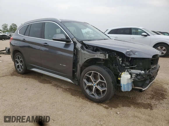 2017 BMW X1 xDrive28i with VIN WBXHT3Z3XH4A53999, listed as a Copart auction lot 60500265 with 43,377 mi miles and Salvage title. Bid and sale history available at DreamBid. Image 4.