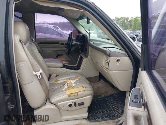 2003 Cadillac Escalade z VIN 1GYEK63N73R203813, wystawiony jako IAAI lot #42138841 z przebiegiem 68 483 mil mil oraz . Historia ofert i sprzedaży dostępna na DreamBid. Obrazek 5.