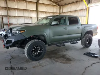 2021 Toyota Tacoma SR with VIN 3TMCZ5AN1MM406169, listed as a Copart auction lot 64645615 with 29,876 mi miles and Clean title. Bid and sale history available at DreamBid. Image 1.