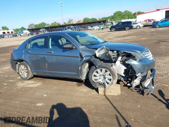2010 Chrysler Sebring Touring z VIN 1C3CC4FB0AN128655, wystawiony jako IAAI lot #42311837 z przebiegiem 205 720 mil mil oraz . Historia ofert i sprzedaży dostępna na DreamBid. Obrazek 14.