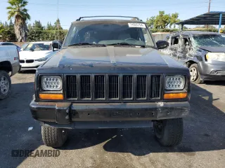 1998 Jeep Cherokee Sport with VIN 1J4FT68S8WL134461, listed as a Copart auction lot 74005704 with 0 mi miles and Salvage Title. Bid and sale history available at carsss.com. Image 5.